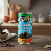 Dunn’s River Black Beans 400g — Caribbean canned black beans on kitchen counter beside ingredients.