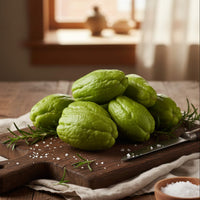 Green vegetables on a wooden cutting board with a rustic background