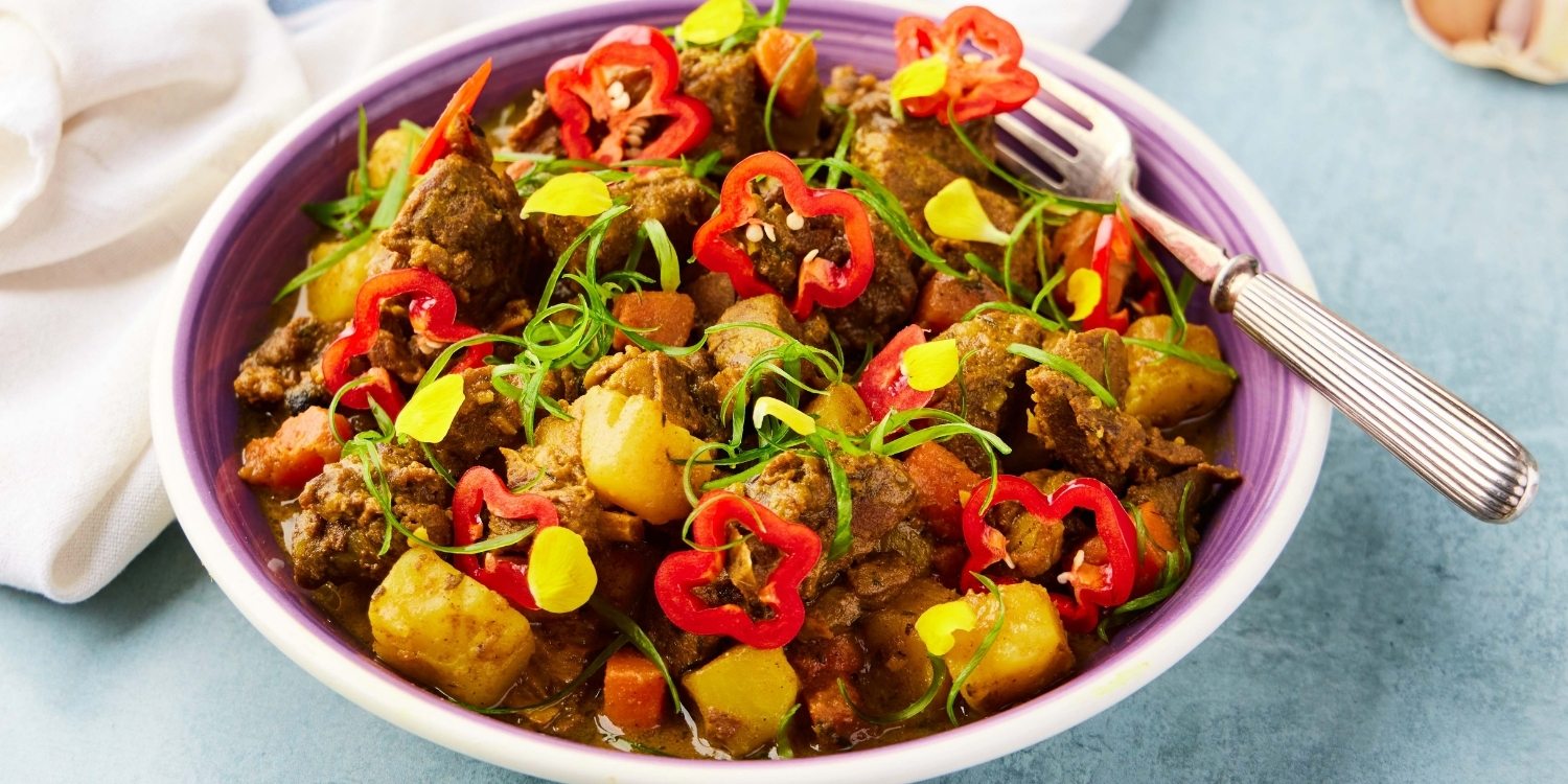 Jamaican-style curry goat, thick curry sauce