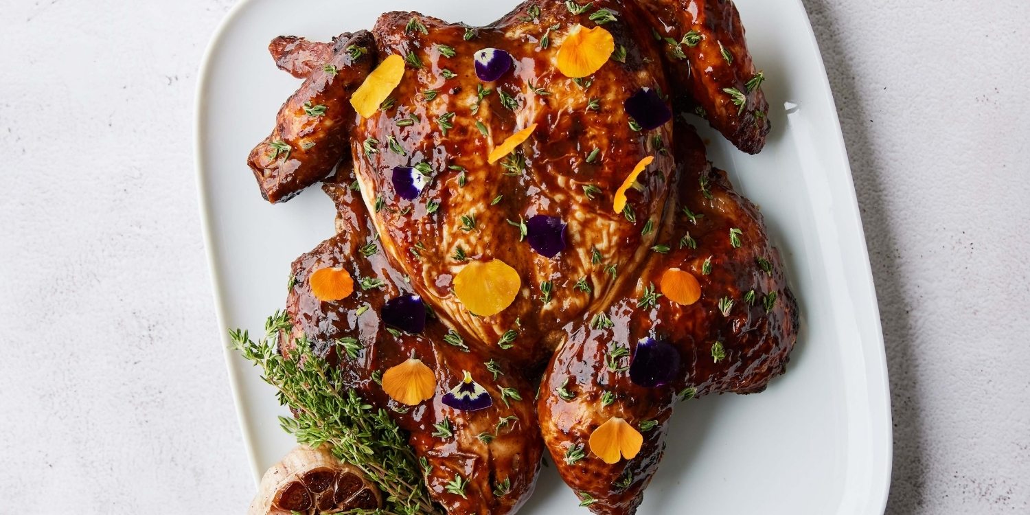 Oven-baked jerk chicken with deep caramelised spice and Caribbean-inspired flavour