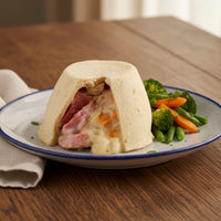 Bacon & onion suet pudding with smoky bacon and caramelised onions in soft suet pastry.