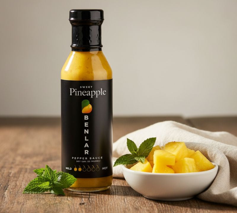 Benlar Sweet Pineapple Pepper Sauce bottle with bright pineapple and mild pepper flavour.