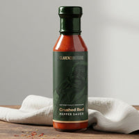 Clarence Dutchie Crushed Red Pepper Sauce bottle with bold Caribbean red pepper flavour and medium heat.