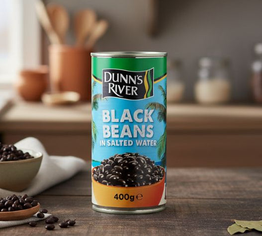 Dunn’s River Black Beans 400g — Caribbean canned black beans on kitchen counter beside ingredients.