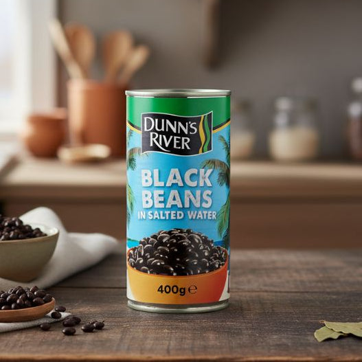 Dunn’s River Black Beans 400g — Caribbean canned black beans on kitchen counter beside ingredients.