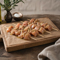 Diced free-range chicken breast kebab coated in garlic butter glaze, gluten-free and ready to cook.
