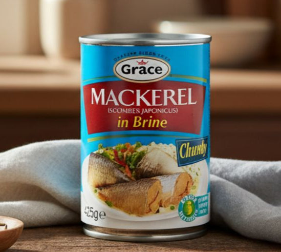 Grace Mackerel in Brine 425g tin on wooden table with herbs and bowl of fish