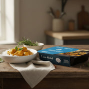 Halal chicken curry with rice in black tray packaging, ready meal by The Black Farmer