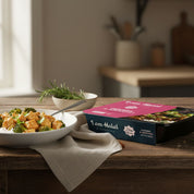 Halal chicken and broccoli with rice ready meal in black tray, fresh prepared 360g portion