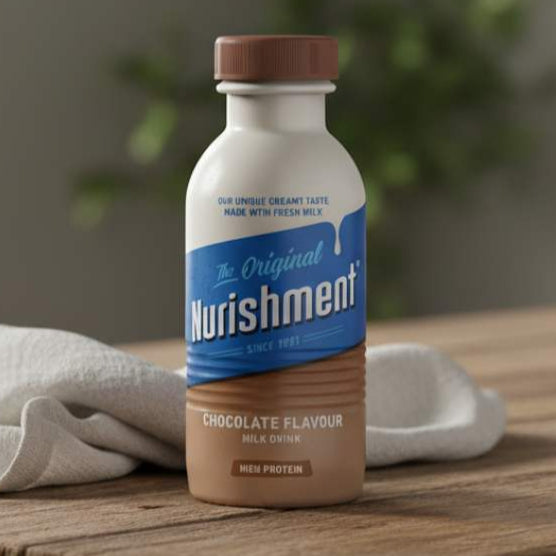Nurishment chocolate-flavored milk drink bottle on a wooden table with a blurred background