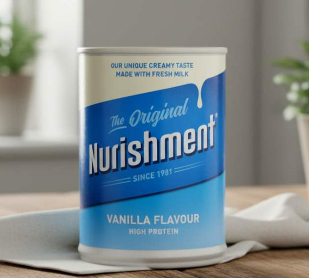 Can of Nurishment Original Vanilla Flavoured Milk on a wooden table with glass of chilled milk.