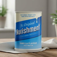 Nurishment vanilla flavour high protein can on a wooden surface with plants in the background