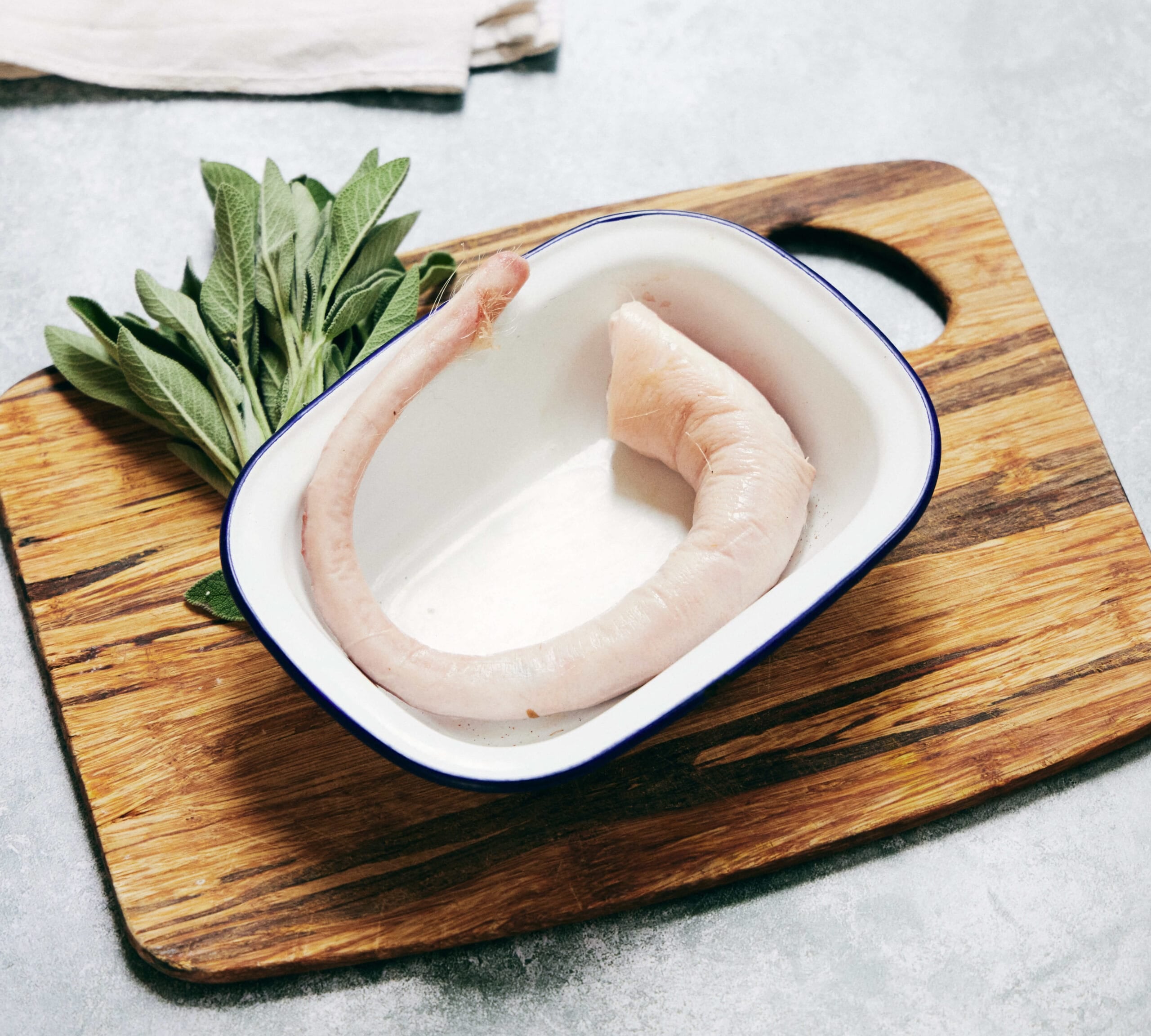 The Black Farmer Pig Tail — British pork cut with rich, collagen flavour, ideal for grilling or braising
