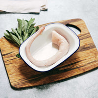 The Black Farmer Pig Tail — British pork cut with rich, collagen flavour, ideal for grilling or braising