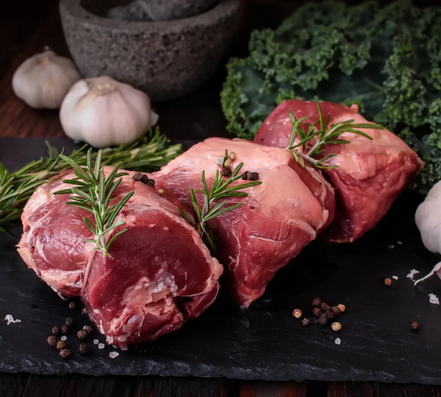 Fresh British lamb rump roast on tray – premium grass-fed lamb cut ideal for roasting and stews.