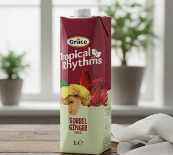 Grace Tropical Rhythms Sorrel Ginger Drink 1L carton on a wooden table with ice and lime slices.