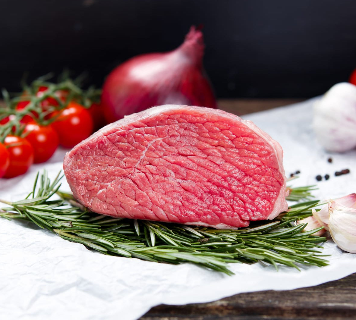 British veal topside joint rolled and trimmed, lean tender meat ready for roast