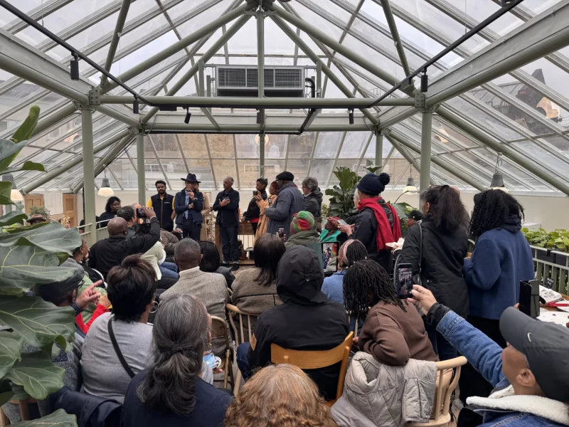 Wilfred_giving_a_talk_to_black_history_month_at_The_Black_Farmer_farmshop_in_Brixton.webp