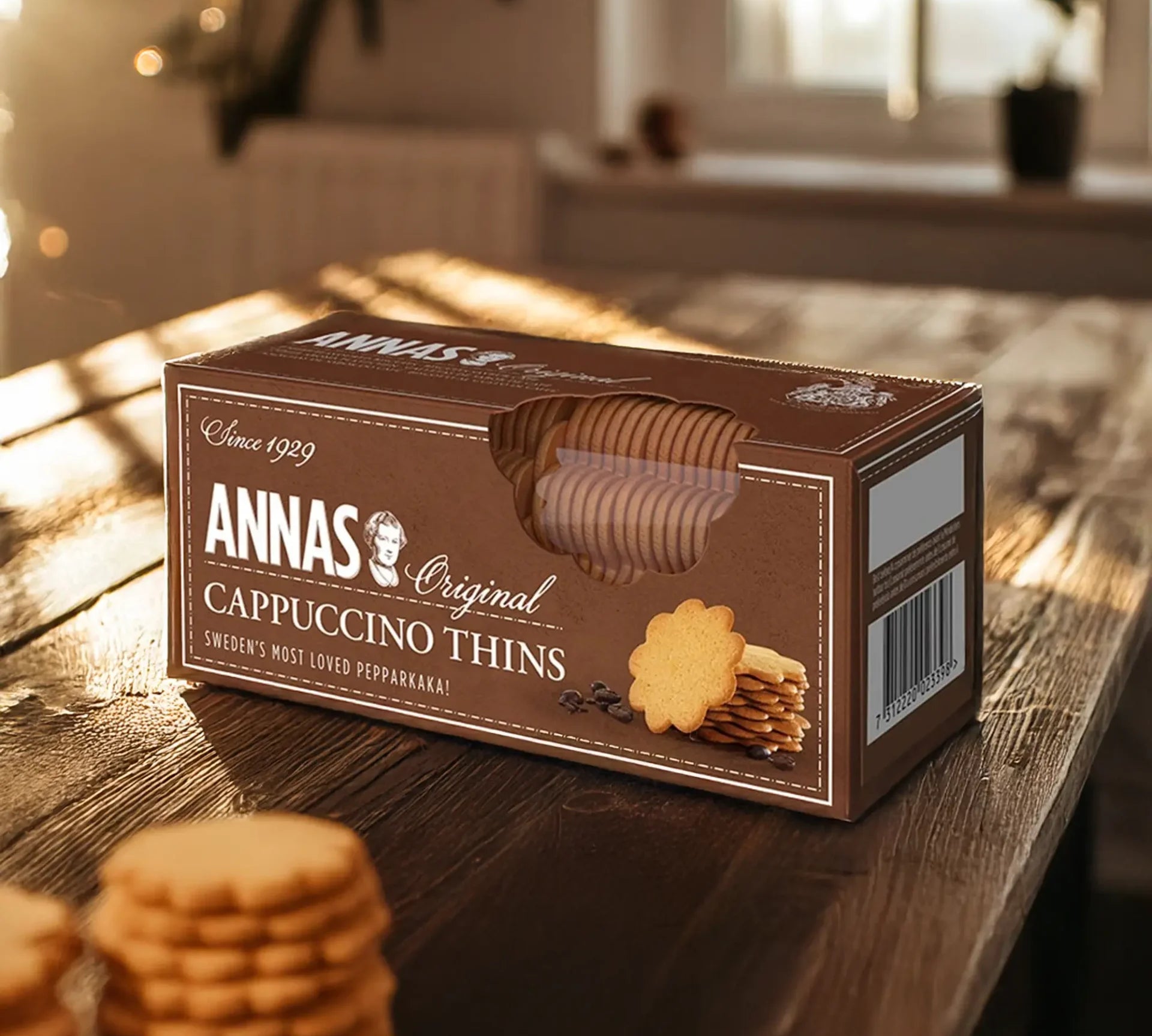 Anna's Cappuccino Thins box placed on a wooden table with soft natural lighting