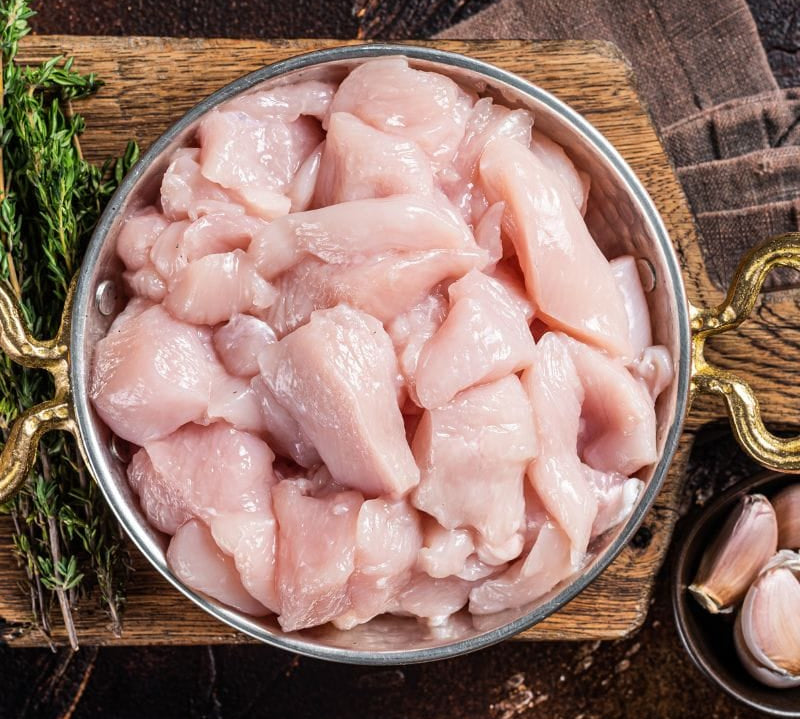 Fresh diced British chicken breast by The Black Farmer — lean, tender, and ready to cook.