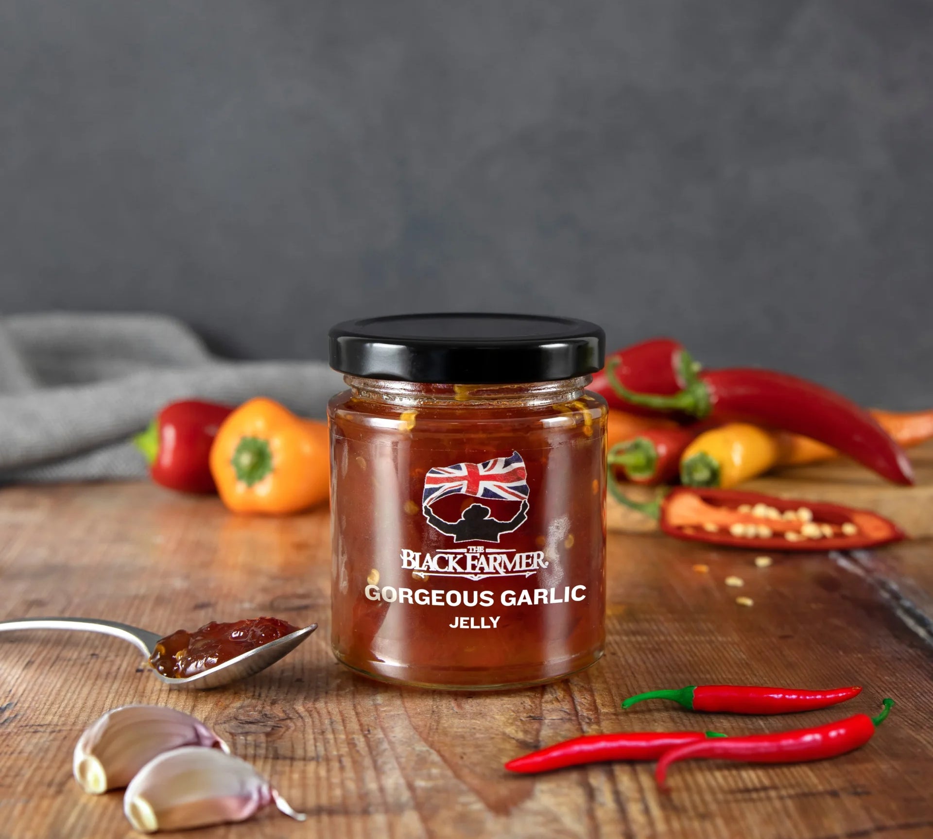Gorgeous Garlic Jelly 220g jar with sweet, mellow garlic flavour from The Black Farmer.