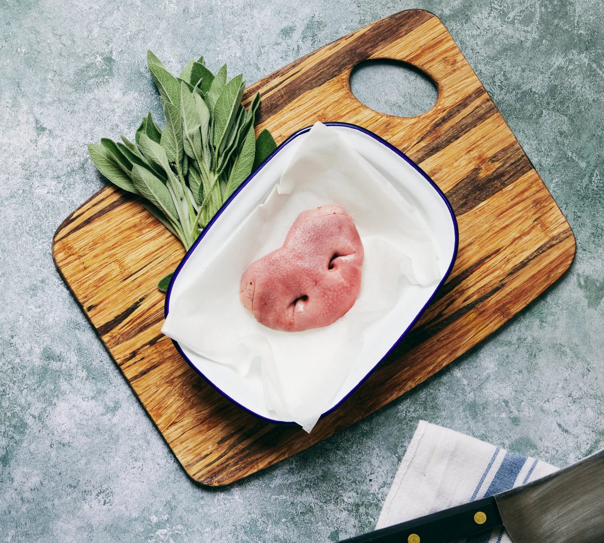 Close-up of The Black Farmer Pig Snout — fresh British pork cut for grilling, braising, or Caribbean recipes.