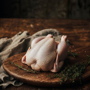Whole British poussin on tray – tender young chicken ideal for roasting or grilling.