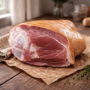 Smoked cured gammon hock from The Black Farmer — traditional British pork, cured and smoked for rich flavour, perfect for stews or roasting.