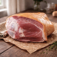 Smoked cured gammon hock from The Black Farmer — traditional British pork, cured and smoked for rich flavour, perfect for stews or roasting.