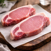 The Black Farmer Bacon Steak Unsmoked – 2 thick-cut 100g British pork steaks, perfect for grilling or frying.
