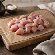 Fresh diced British chicken breast by The Black Farmer — lean, tender, and ready to cook.