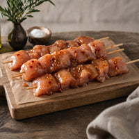 Diced British chicken breast kebabs coated in sweet chilli glaze, gluten-free and ready for grilling or pan-frying.