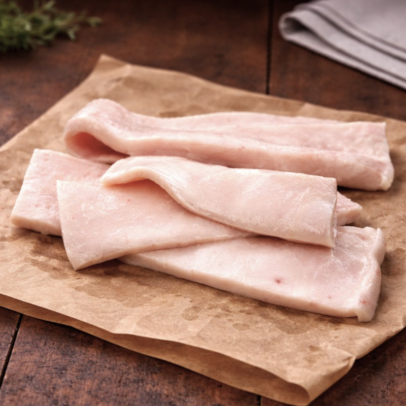 raw pork fat on a butcher paper