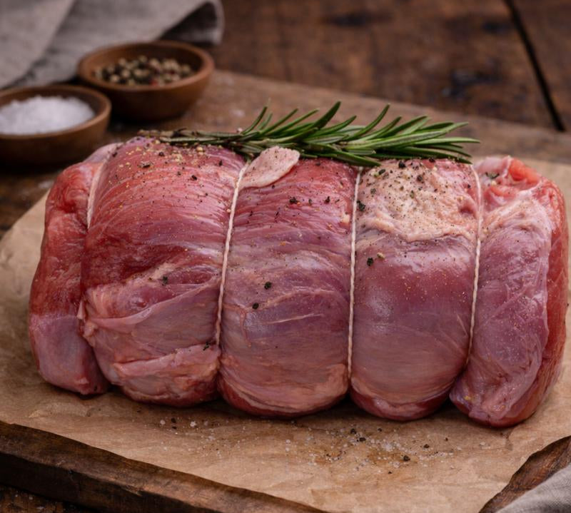British veal topside joint rolled and trimmed, lean tender meat ready for roast