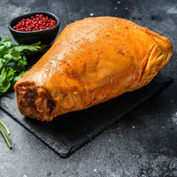 Smoked cured gammon hock from The Black Farmer — traditional British pork, cured and smoked for rich flavour, perfect for stews or roasting.